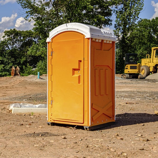 how often are the portable restrooms cleaned and serviced during a rental period in Sand Beach